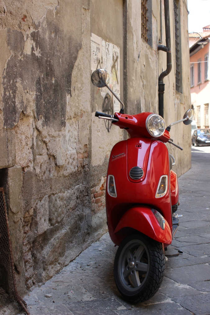 You know you are in Italy when you run into those in all different models, sizes, and colors specially my favorite which is Red ;) - Photo taken in the town of Lucca